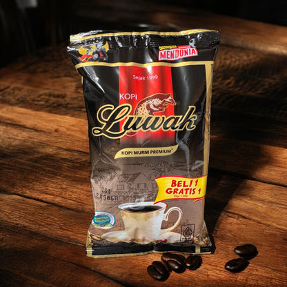 Luwak Kaffee Pulver von Nesia Food, dunkler Kaffee in einer Packung, ideal für Getränke, frisch und aromatisch.