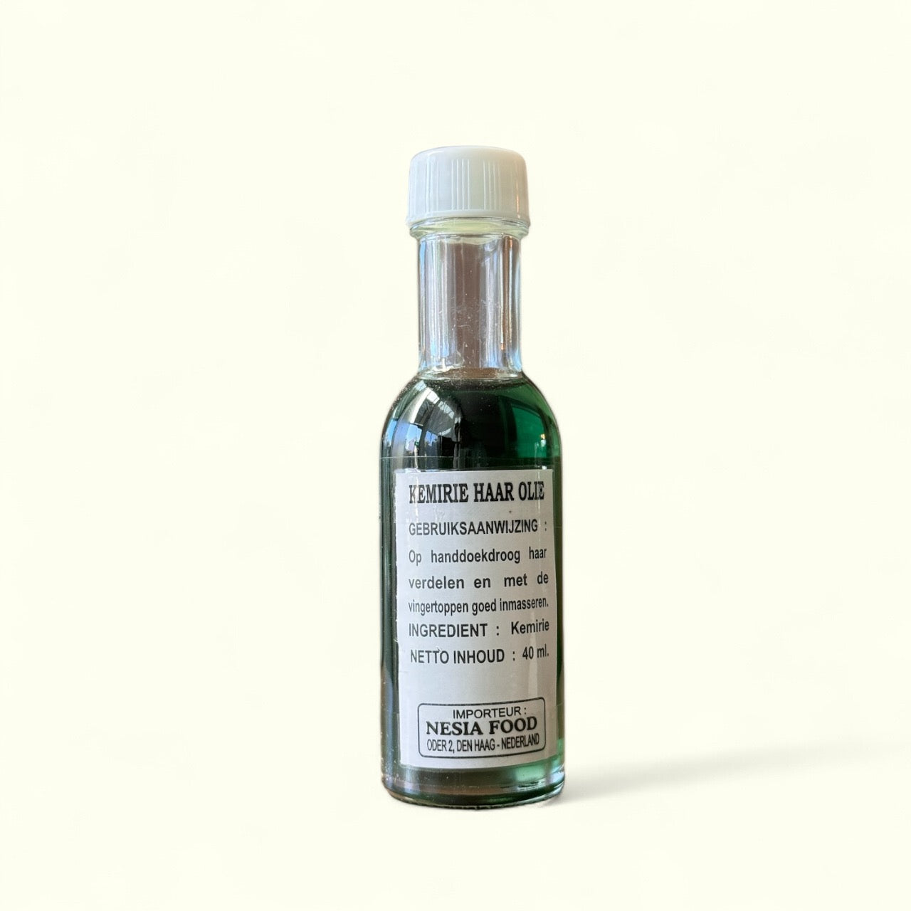 Nesia Minyak Rambut Kemiri Rosalina - Dua Kemiri, flüssiges Haaröl in dunkler Flasche, natürliche Haarpflege, nicht essbar